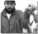 Mike Giuliano, son of my next door Vince, is one of the young people, other than my own children and grandchildren, to whom I have passed on my love of angling. Here he holds a white perch.