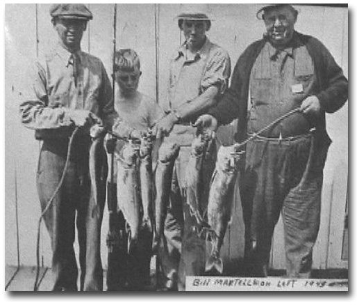 Bill Martel (left) with party he guided for lakers and salmon in 1949.