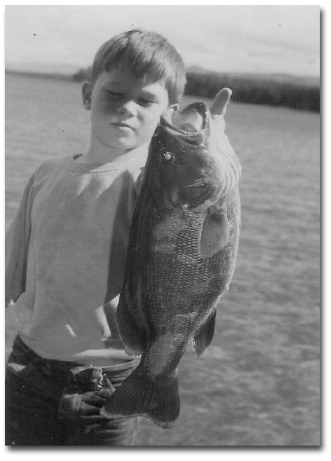 Son Gregg with prize winning Field & Stream Jr. Div SM bass. 1971.