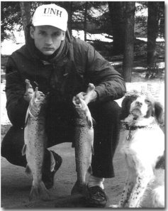 Carl Gebhardt's son Jim, and dog with 2 nice Lake Winni salmon.