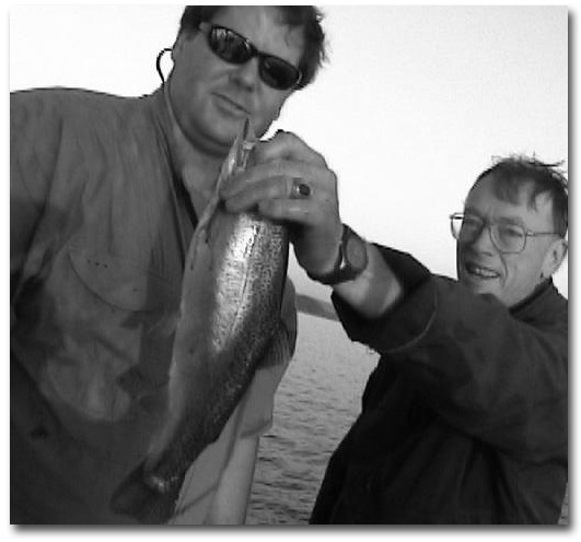 Alan Nute with a Rainbow Trout he caught trolling his night crawler rig.