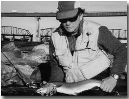 Carl Gephardt with big rainbow trout caught on a fly.