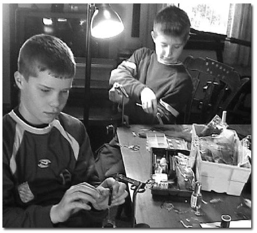 Grand Dad French passes down his fly tying skills to his grand sons, Tom & Will MacPhee.