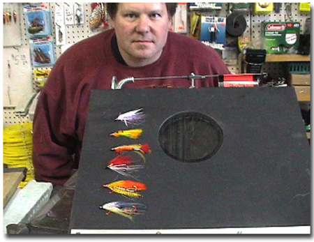 Alan Nute’s favorite flies on an ice fishing jig box, developed and tested in Wisconsin where it caught two to one more fish than non-jigged tip ups.