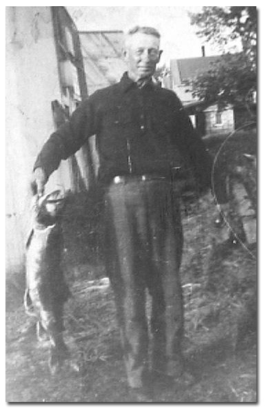 Bill Martel with a fefty Laker, circa 1935.