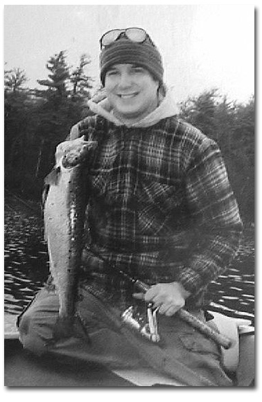 Chuck French's son, Andy, with a nice spring salmon. Chuck's main role is to be a good mentor and to pass angling down to his sons, daughters, and grandchildren. Andy is the artist who created the cover for this book.