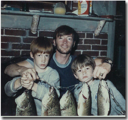 The author with sons Eric and Gregg iin 1970 with great string of bass. We don't catch as many big ones now that there are over 85 bass tournaments per summer on Lake Winni.