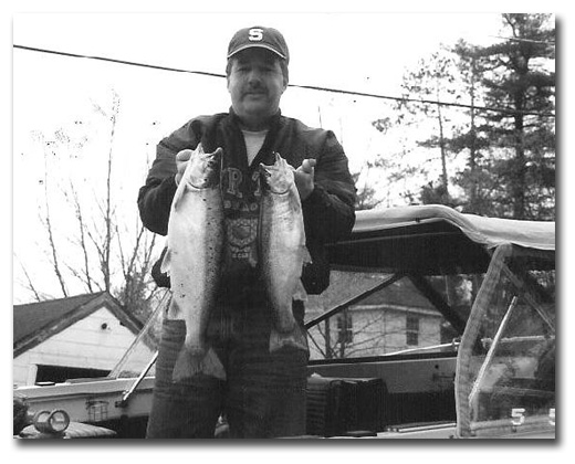 Master Angler Steve Perry with nice salmon and rainbow trout.