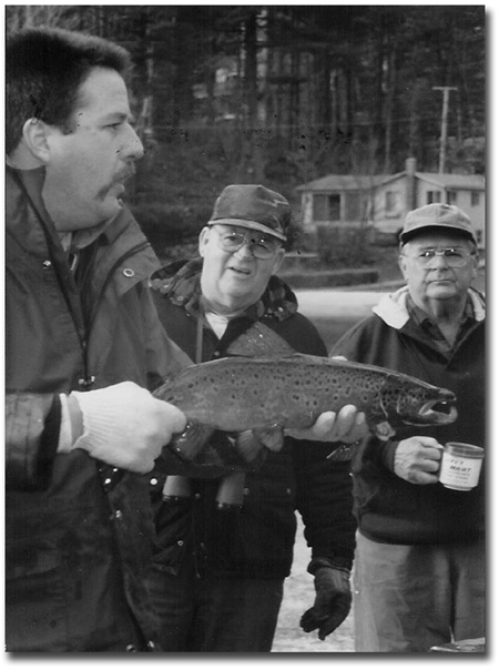 Steve Perry with large hooked jaw male salmon in fall.